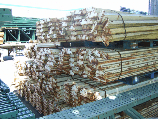 Stack of rusted-out pallet rack beams